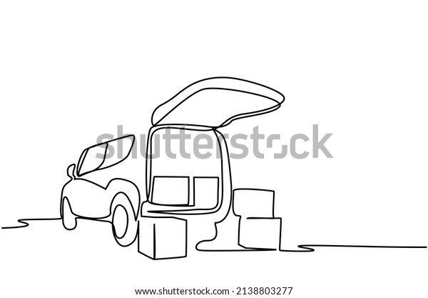 a cargo car tailgate is open and cargo\
boxes are on the floor and inside the\
car