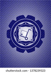 cargo icon inside badge with denim texture