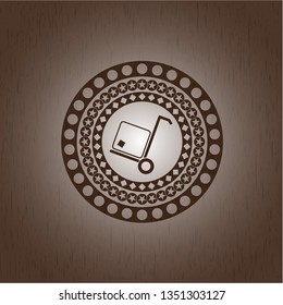 cargo icon inside badge with wooden background