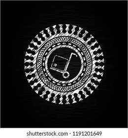 cargo icon inside chalkboard emblem