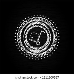 cargo icon inside chalkboard emblem on black board