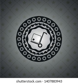 cargo icon inside dark badge or emblem