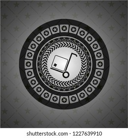 cargo icon inside dark emblem