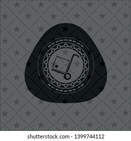 cargo icon inside dark emblem