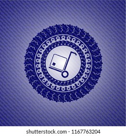 cargo icon inside emblem with denim texture