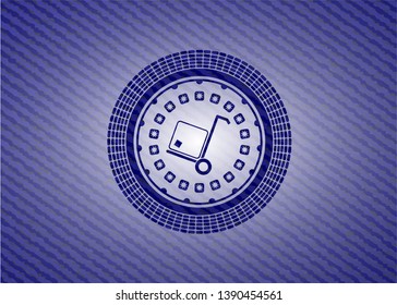 cargo icon inside emblem with denim texture