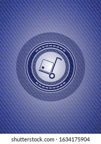 cargo icon inside emblem with denim high quality background