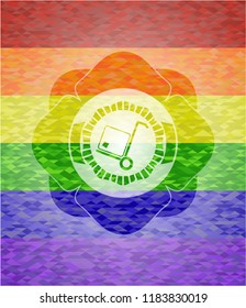 cargo icon inside emblem on mosaic background with the colors of the LGBT flag