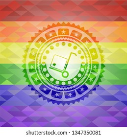 cargo icon inside emblem on mosaic background with the colors of the LGBT flag