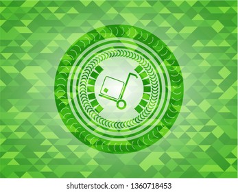 cargo icon inside green emblem with triangle mosaic background