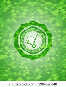 cargo icon inside green emblem with mosaic ecological style background