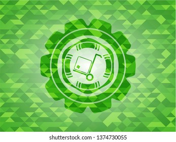cargo icon inside green mosaic emblem