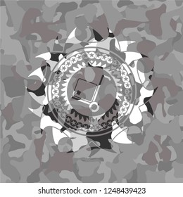 cargo icon inside grey camouflage emblem