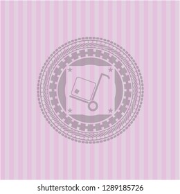 cargo icon inside pink emblem