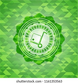 cargo icon inside realistic green mosaic emblem
