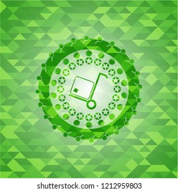 cargo icon inside realistic green mosaic emblem