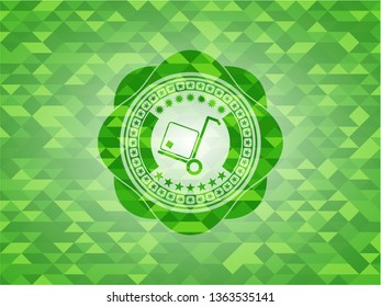 cargo icon inside realistic green mosaic emblem