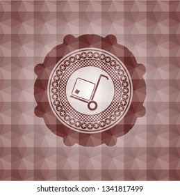 cargo icon inside red seamless geometric emblem.