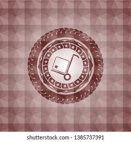 cargo icon inside red seamless geometric badge.