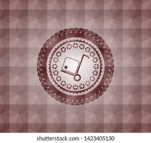 cargo icon inside red seamless emblem with geometric pattern.