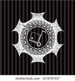 cargo icon inside silvery emblem or badge