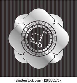 cargo icon inside silvery emblem