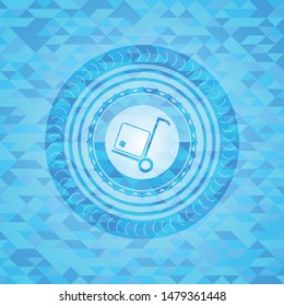 cargo icon inside sky blue mosaic emblem