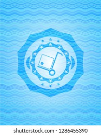 cargo icon inside water representation emblem.