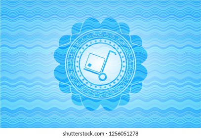 cargo icon inside water wave emblem.