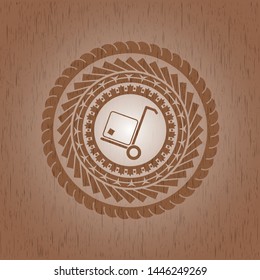cargo icon inside wood badge or emblem