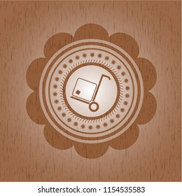 cargo icon inside wooden emblem. Vintage.