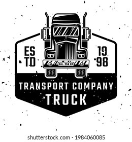 Cargo transport company vector monochrome emblem, badge, label or logo with truck isolated on white background with removable textures
