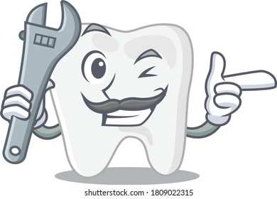 A caricature picture of tooth working as a mechanic