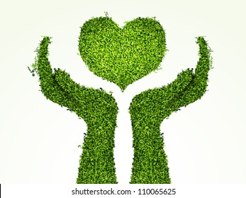 caring for the environment, arms out of the grass with his heart. The concept of ecology