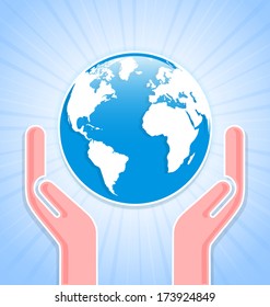Caring hands with planet Earth on blue background with rays
