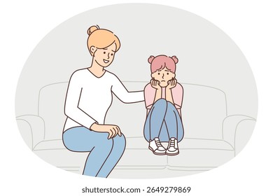 Caring mother stroking upset daughter on back sitting on couch after quarrel or important conversation. Kind mother supports teenage girl and wants to distract child during separation from father
