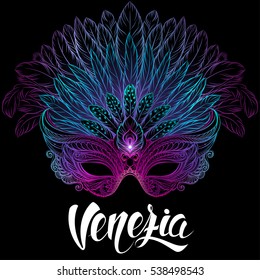 Carnival mask with feathers on black background. Venetian carnival. Concept design with hand drawn lettering for t-shirt print,  poster, greeting card, party invitation, banner or flyer.