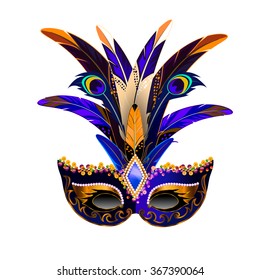 The carnival mask with multicolor feathers. The mask decorated with golden pattern and sequins.