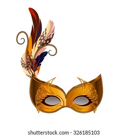 Carnival Venetian mask decorated with orange, brown and beige feathers. The mask decorated with golden pattern.