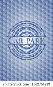 Car-park blue badge with geometric pattern.