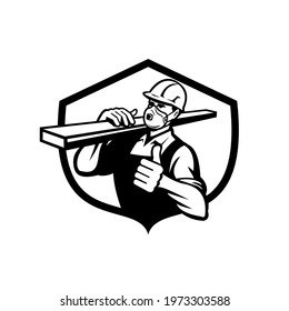 Carpenter Wearing Particulate Respirator Carrying Lumber with Thumbs Up Set In Shield Retro Style