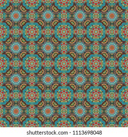 Carpet with ethnic ornament. Motley center in blue, green and orange tones. Vector seamless pattern, luxurious colourful old design.