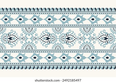 Carpet pattern,Ikat floral pattern on white background vector illustration.Ikat ethnic oriental embroidery.Aztec style,abstract background.design for texture,fabric,clothing,decoration,carpet,print.