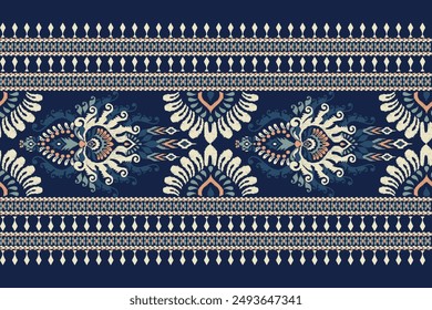 Carpet pattern,Ikat floral pattern on navy blue background vector illustration.Ikat ethnic oriental embroidery.Aztec style,abstract background.design for texture,fabric,clothing,decoration,carpet,rug.