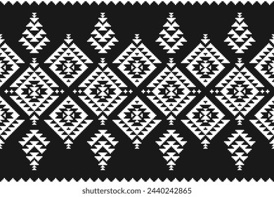 Carpet tribal pattern art. Geometric ethnic seamless pattern traditional. American, Mexican style. Design for background, wallpaper, illustration, fabric, clothing, carpet, textile, batik, embroidery.