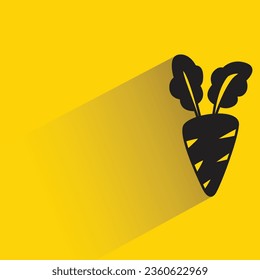 carrot with shadow on yellow background