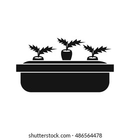 Carrots in a wooden pot icon in simple style isolated on white background. Vegetables symbol vector illustration