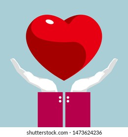 Carry a heart symbol in both hands. Isolated on blue background.