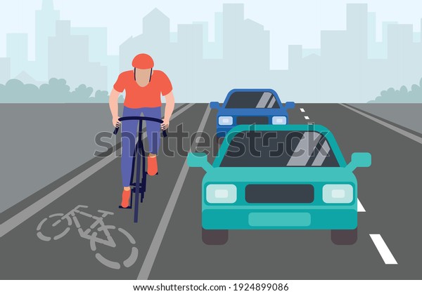 Cars and cyclist on the bike path. A man in\
a helmet and sportswear rides a bicycle on the road with cars.\
Highway. Traffic rules. Front view of an asphalt city road. Flat\
vector illustration.