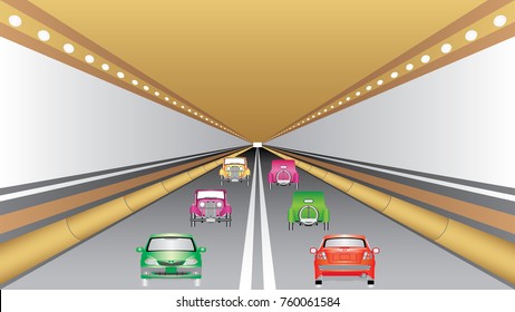 Cars in tunnel. Cars moving through the road tunnel.